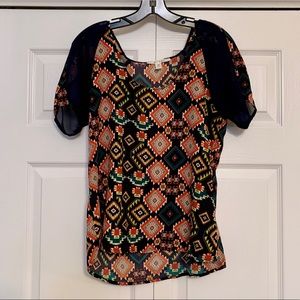 Navy short-sleeve blouse from Francesca’s boutique
